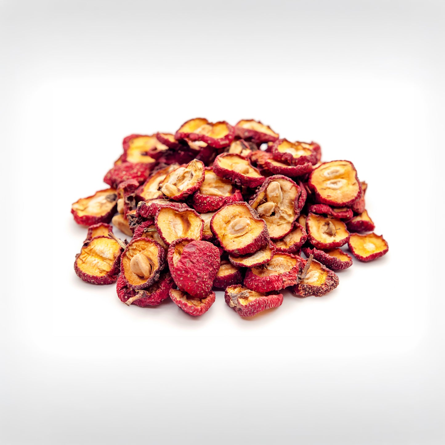 Dried hawthorn fruit on white background
